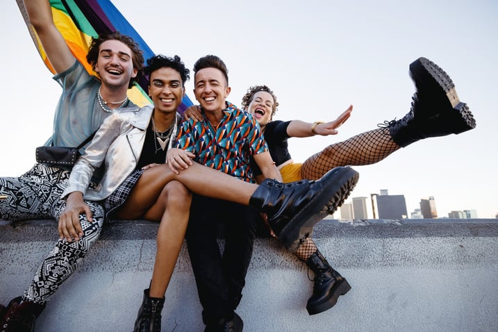 Four LGBTQ+ people celebrating pride-1