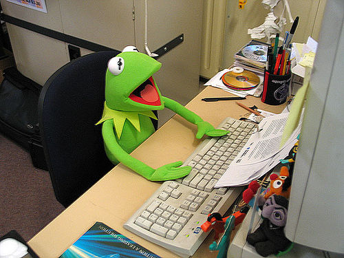 Kermit the Frog, overawed at a computer.