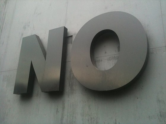 Big sign reading 'NO'.