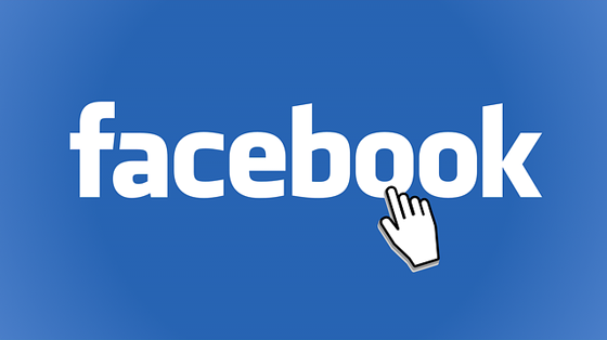 Facebook logo with mouse pointer.