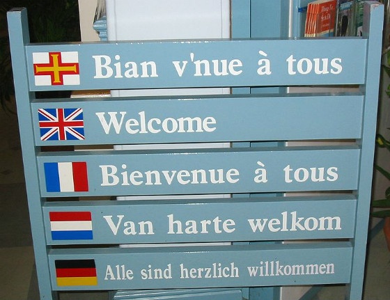 A sign displaying 'welcome' in several languages.