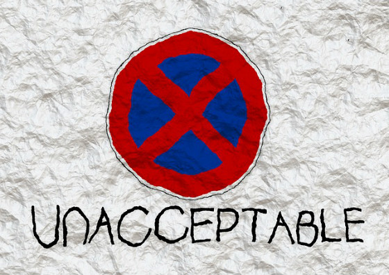 Sign reading 'Unacceptable'.
