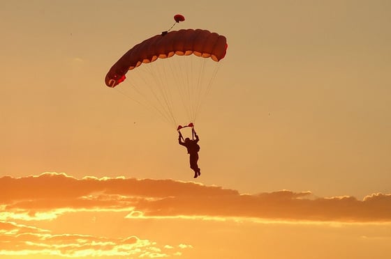 Skydiving at sunset.