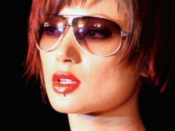 model wearing ray ban sunglasses