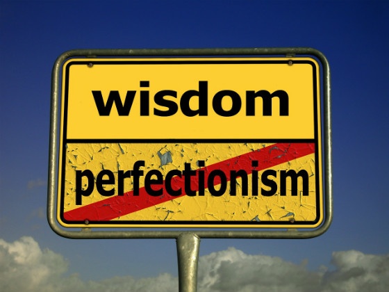 Wisdom / Perfection road sign